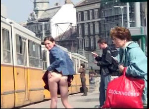 Shameless maiden  raises her microskirt